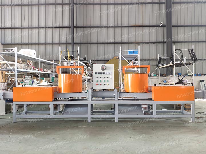 Compressed wood block making machine